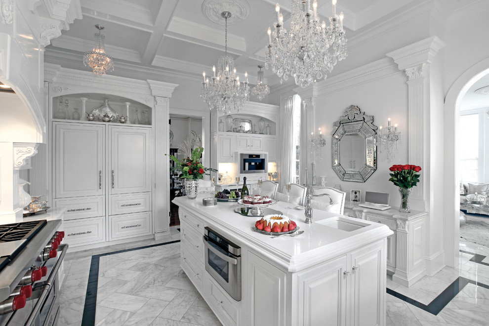 Inspiration for a large traditional u-shaped eat-in kitchen in New York with white cabinets, quartzite benchtops, panelled appliances, a farmhouse sink, beaded inset cabinets, white splashback, subway tile splashback, marble floors and with island.