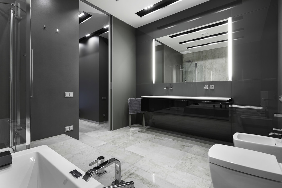 Esempio di una stanza da bagno design di medie dimensioni con pareti grigie