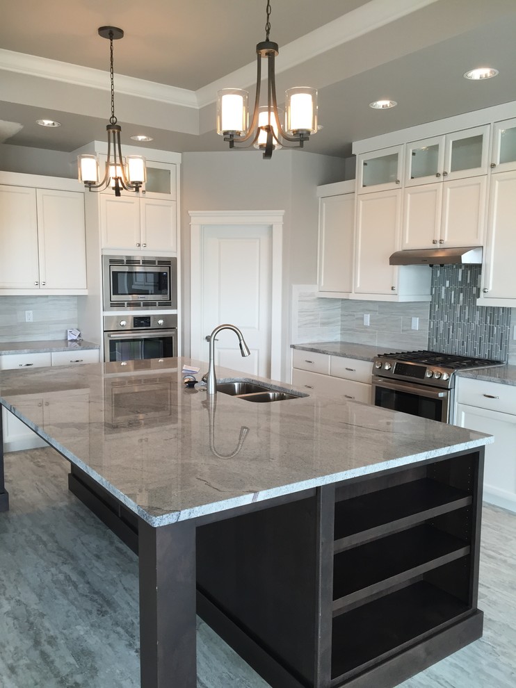 Example of a transitional kitchen design in Boise