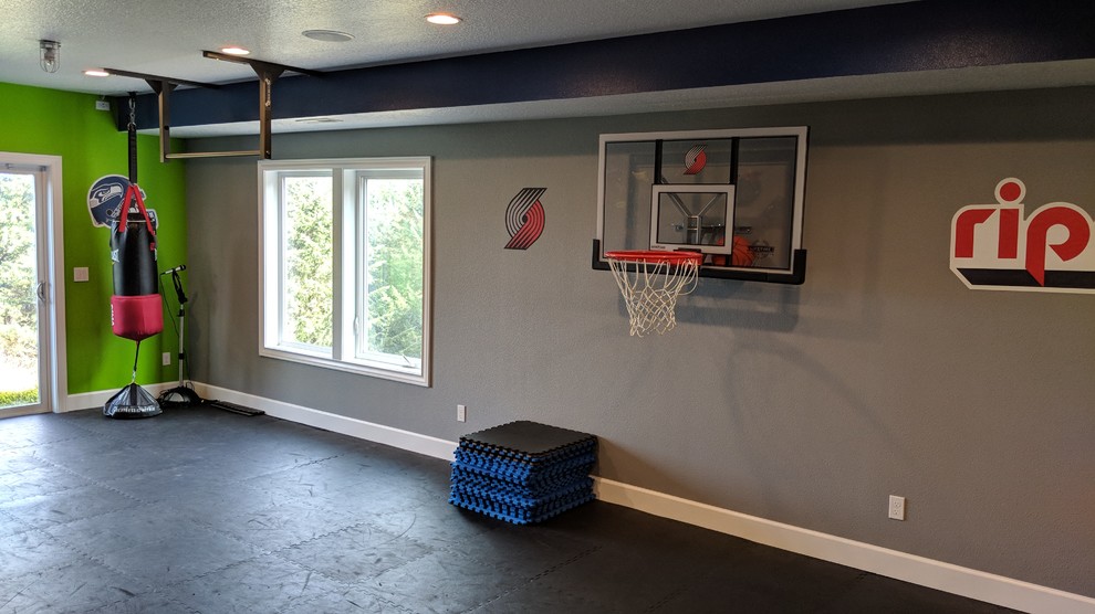 Design ideas for a mid-sized contemporary multipurpose gym in Portland with multi-coloured walls and black floor.