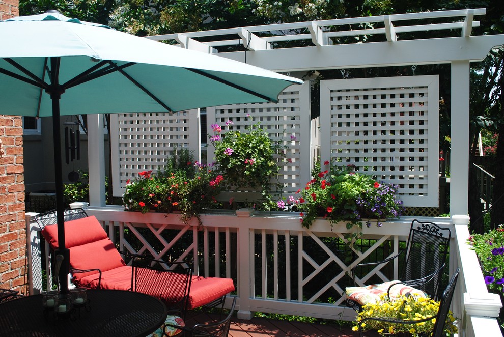 This is an example of an eclectic backyard deck in Other.
