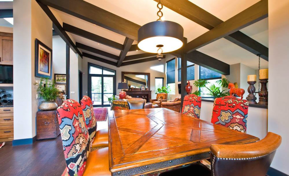 Dining room - rustic dining room idea in Calgary