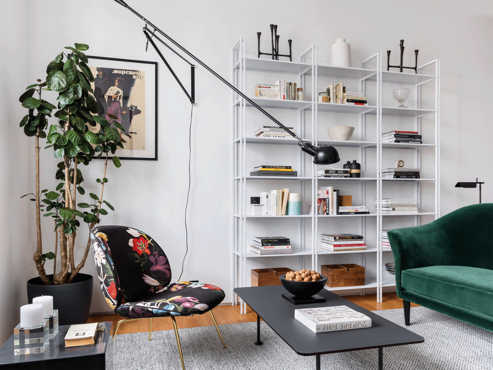 Contemporary living room in Moscow with white walls, medium hardwood floors and brown floor.