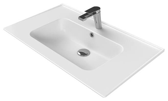 white rectangular drop in bathroom sink