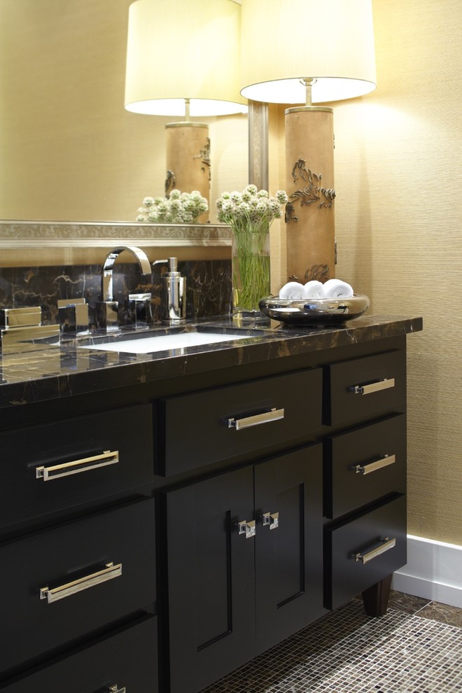 Transitional powder room in San Francisco with an undermount sink, shaker cabinets, black cabinets, marble benchtops and black benchtops.