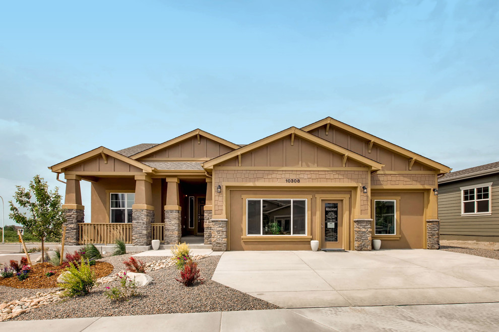 Large mountain style home design photo in Denver