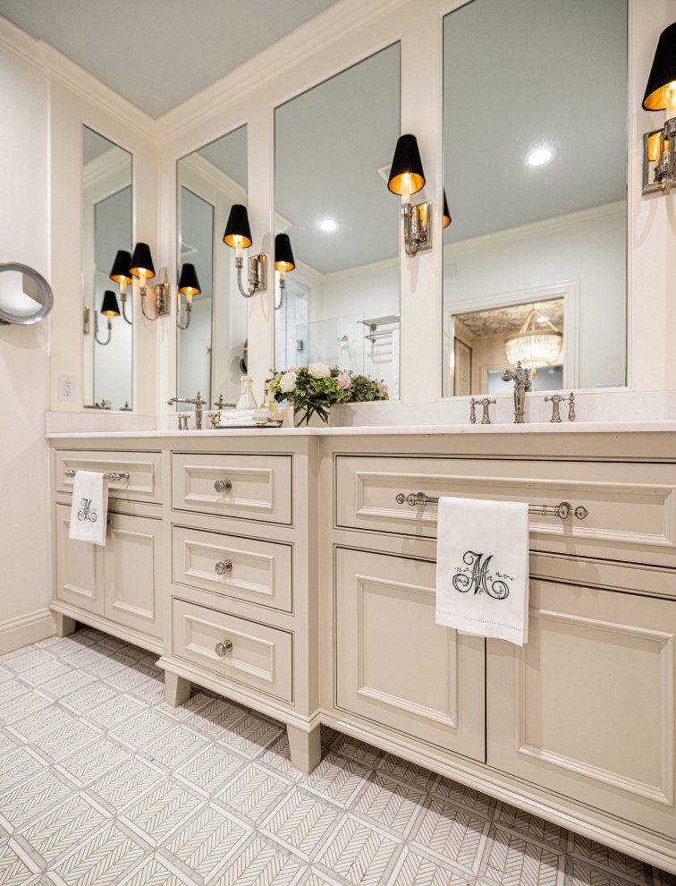 Bathroom - transitional master mirror tile ceramic tile, gray floor and double-sink bathroom idea in Dallas with recessed-panel cabinets, beige cabinets, white walls, an undermount sink, a hinged shower door, white countertops and a built-in vanity