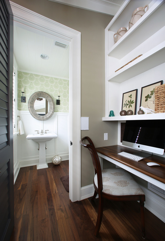 Photo of a tropical powder room in Tampa with a pedestal sink.