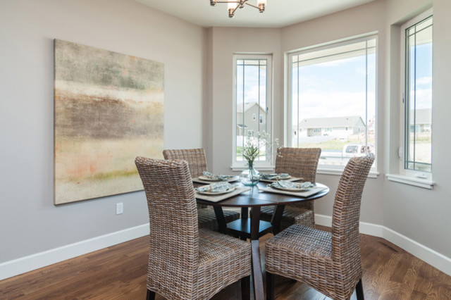 Kitchen/dining room combo - small transitional medium tone wood floor kitchen/dining room combo idea with gray walls