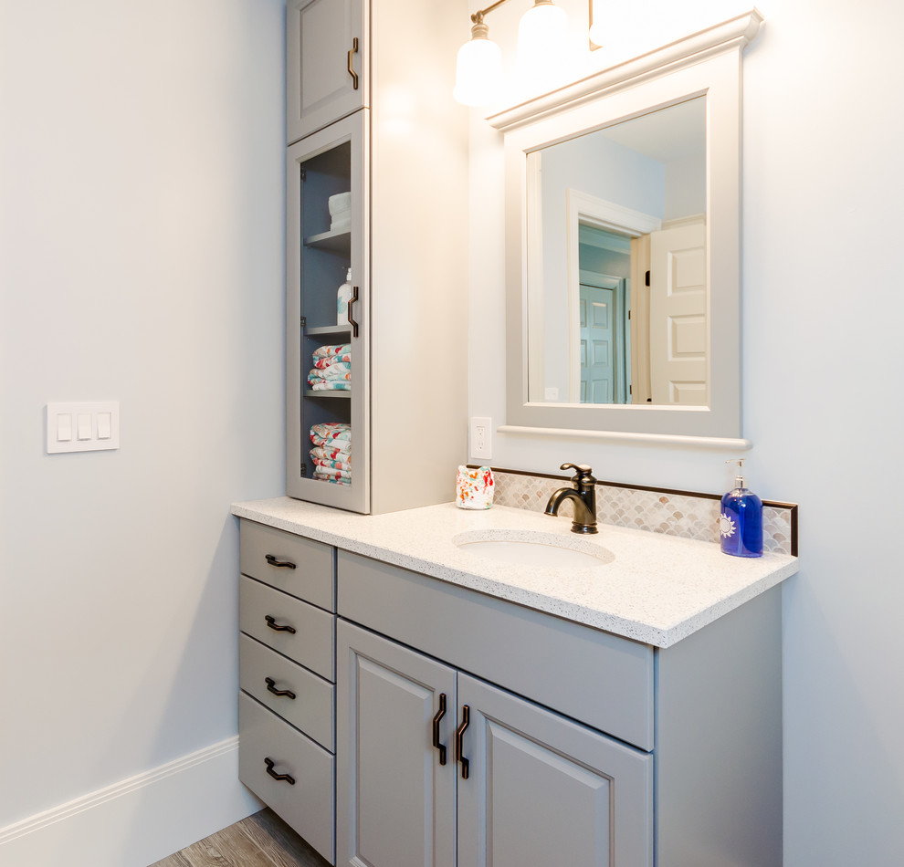 Inspiration for a beach style kids bathroom in Boston with raised-panel cabinets, grey cabinets, grey walls, an undermount sink and granite benchtops.