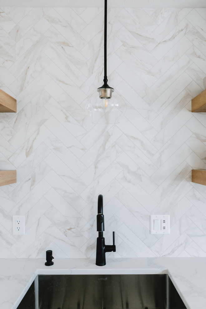 Example of a transitional kitchen design in Edmonton