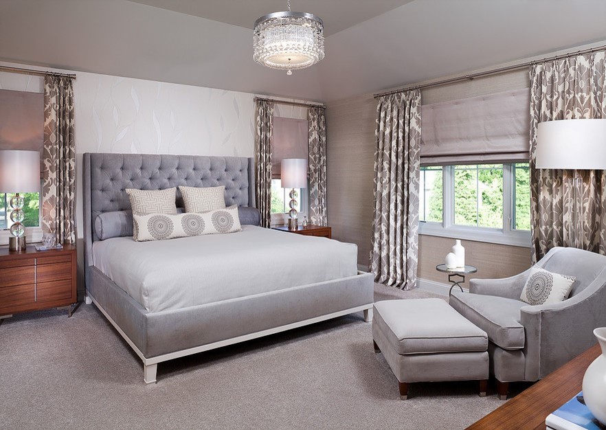 Photo of a large contemporary master bedroom in New York with grey walls, carpet and grey floor.