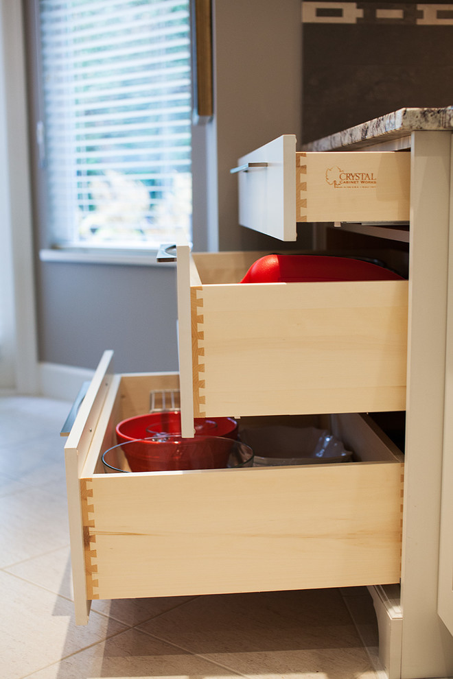 Example of a transitional home design design in Vancouver