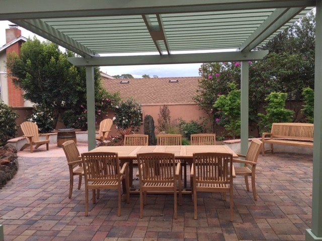 Inspiration for a mid-sized traditional backyard patio in San Francisco with a pergola.