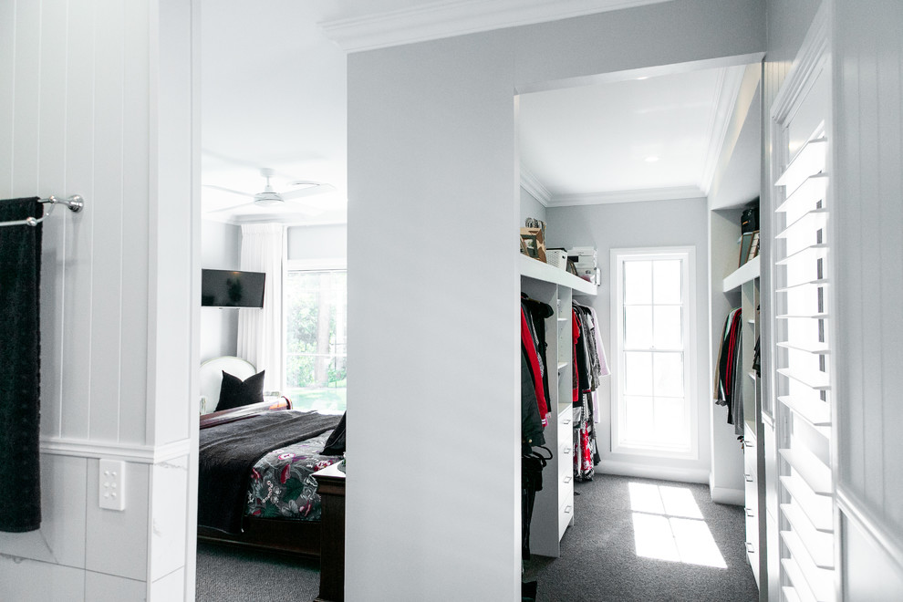 Photo of a contemporary master bedroom in Sunshine Coast with grey walls, carpet and grey floor.