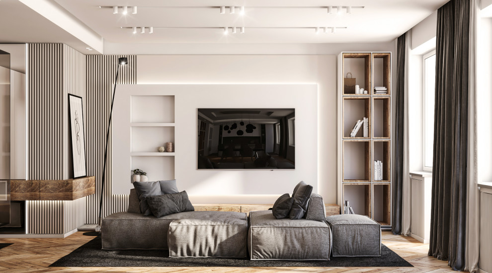 Ispirazione per un ampio soggiorno design aperto con pareti bianche, parquet chiaro, TV a parete, pavimento marrone e soffitto ribassato