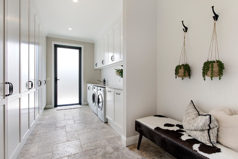 This is an example of a mediterranean laundry room in Sunshine Coast.