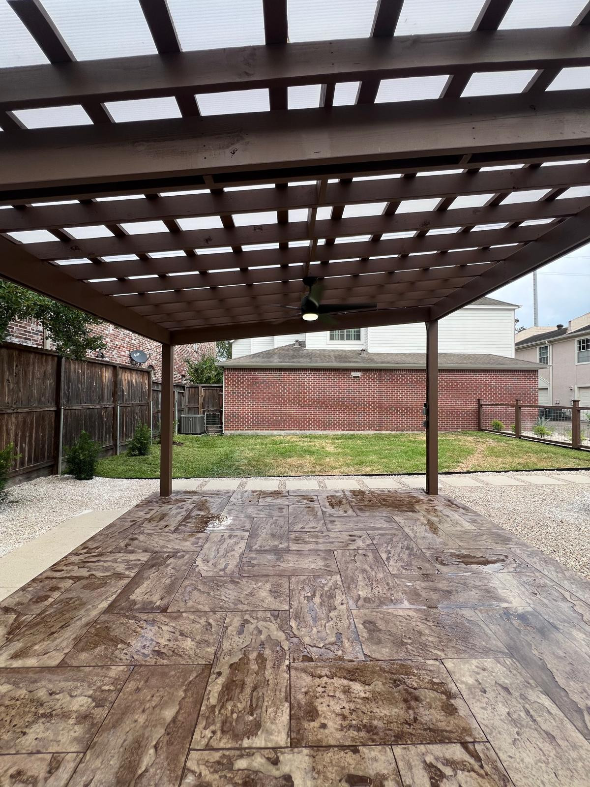 Beautiful stamped concrete patio with Pergola Cover on Haddon st!