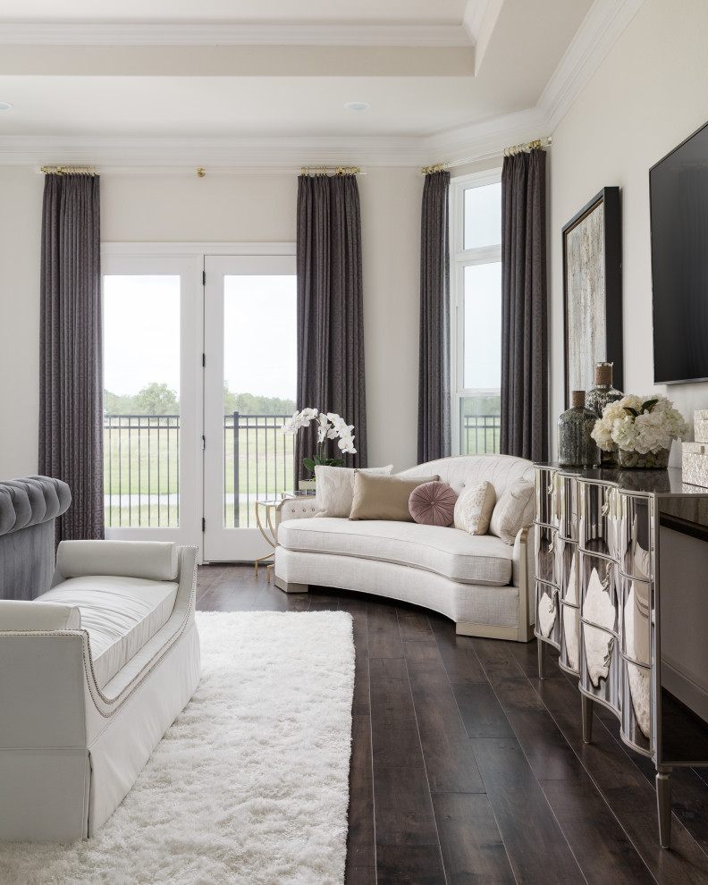Design ideas for a large classic master bedroom in Houston with white walls, dark hardwood flooring, brown floors and a coffered ceiling.