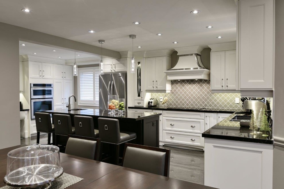 Example of a transitional kitchen design in Toronto