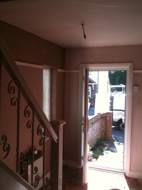 This is an example of a medium sized traditional home in Hampshire.