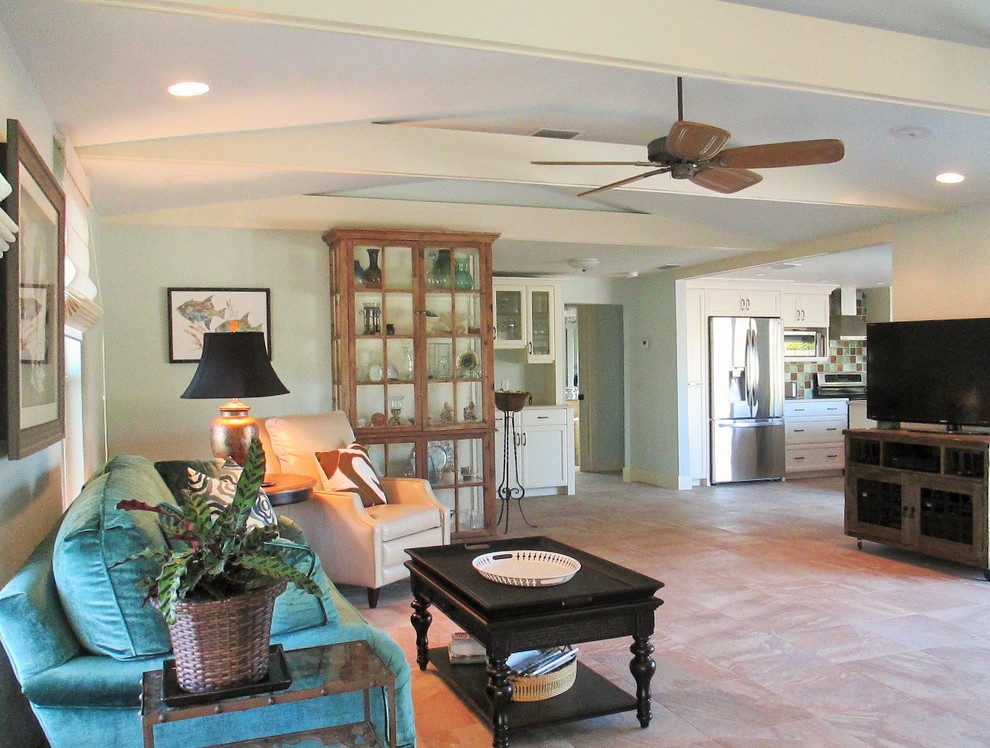 Photo of a beach style family room in Tampa.