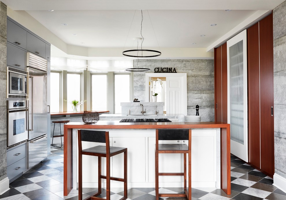 Photo of a mid-sized modern single-wall eat-in kitchen in Toronto with a double-bowl sink, flat-panel cabinets, blue cabinets, stainless steel appliances, marble floors, marble benchtops, multiple islands and multi-coloured floor.