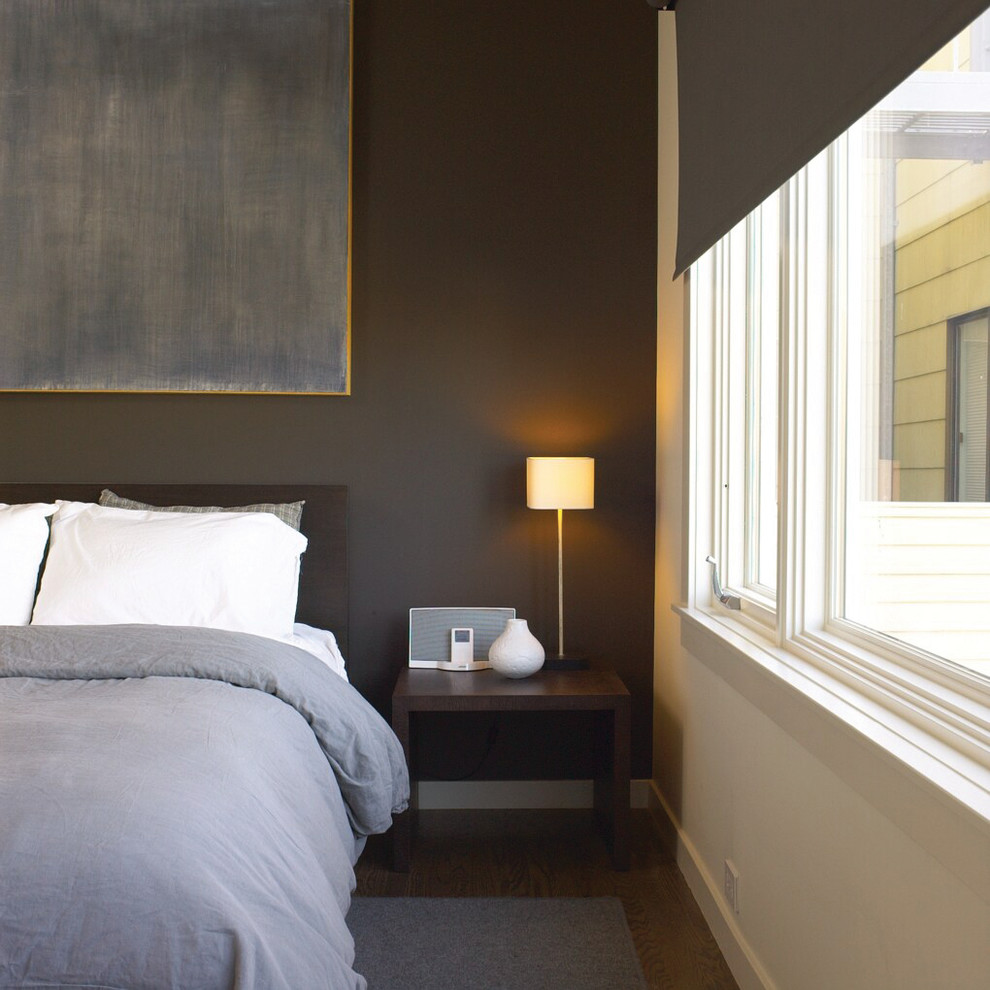 Inspiration for a transitional bedroom in San Francisco with grey walls and dark hardwood floors.