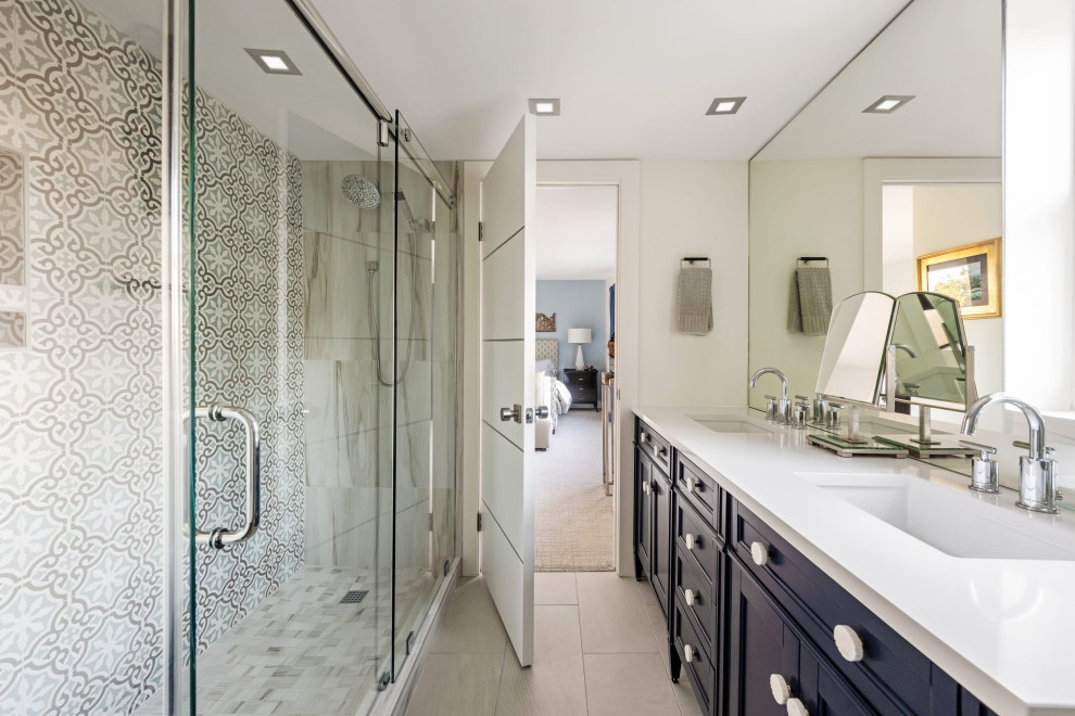 Inspiration for a mid-sized transitional double-sink sliding shower door remodel in Other with an undermount sink and a freestanding vanity