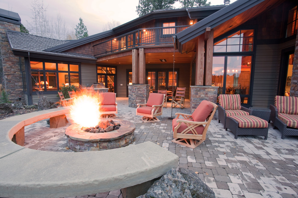 Inspiration for a traditional patio in Portland with a fire feature.