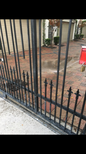 Wrought Iron Fence Renewed & Repainted.