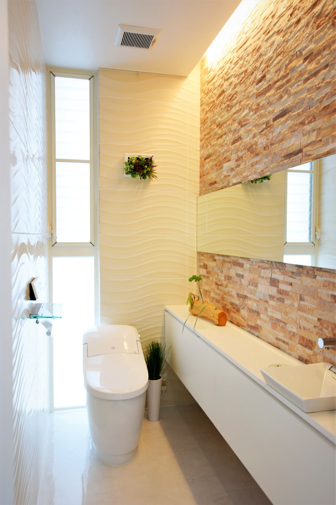Modern powder room in Other with brown tile, white floor and vinyl floors.