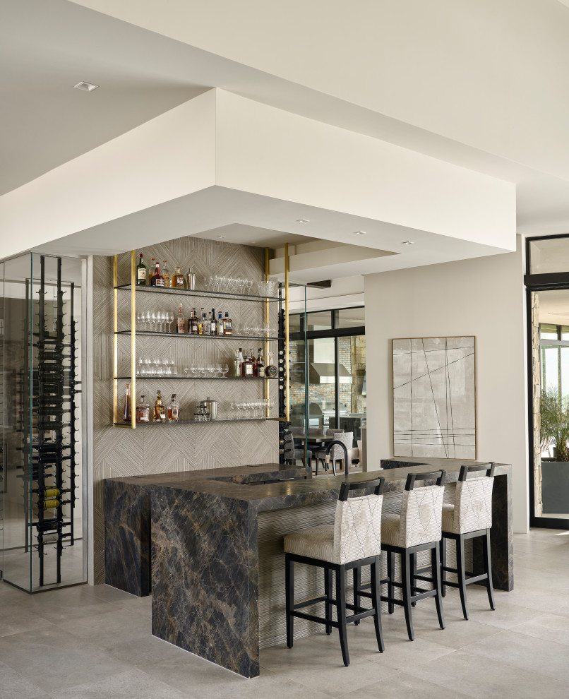 This is an example of a contemporary home bar in Phoenix.