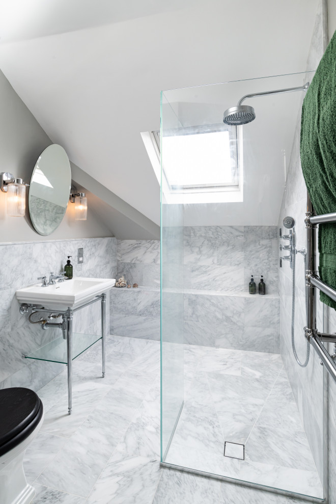 Inspiration for a transitional bathroom in London with a curbless shower, gray tile, grey walls, a console sink, grey floor and an open shower.