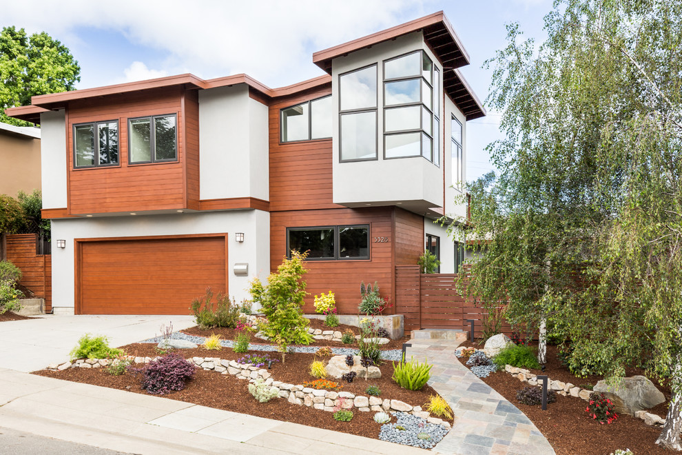Large contemporary two-storey grey exterior in San Francisco with mixed siding and a flat roof.
