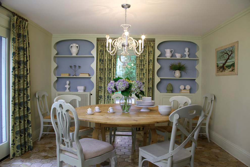 Design ideas for a traditional dining room in Chicago with green walls.