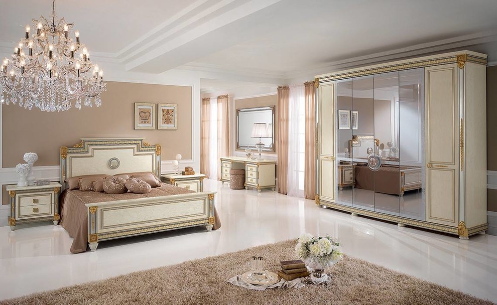 Inspiration for a large traditional master bedroom in Los Angeles with beige walls, porcelain floors, no fireplace and white floor.