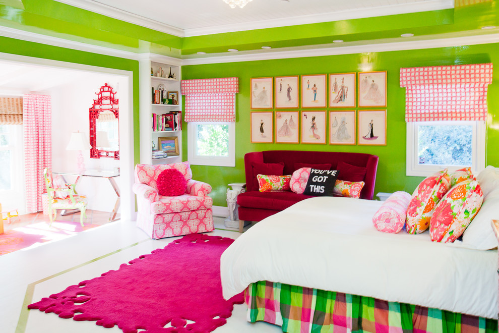 Photo of an eclectic bedroom in San Francisco with green walls, painted wood floors and no fireplace.