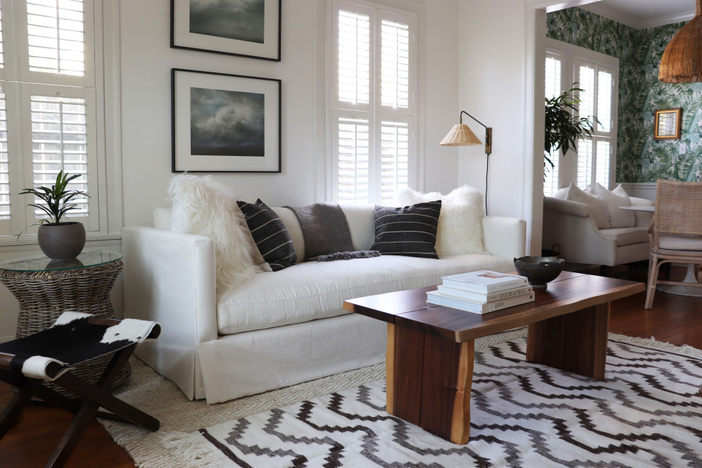 Inspiration for a mid-sized transitional open concept living room in Austin with white walls.