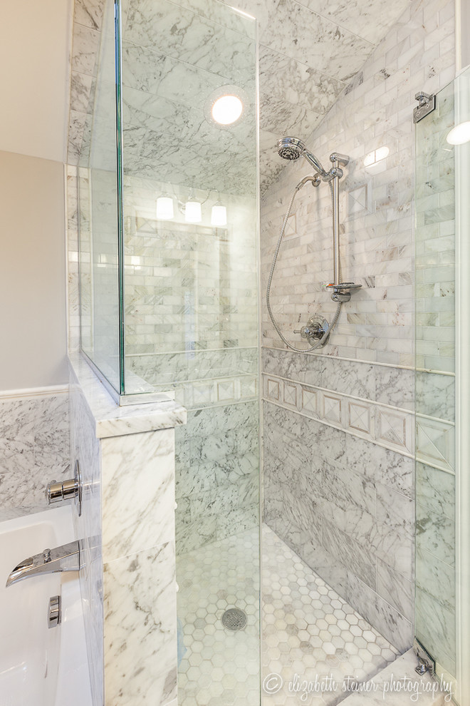 Design ideas for a mid-sized transitional master bathroom in Chicago with an undermount sink, marble benchtops, a drop-in tub, a corner shower, gray tile, grey walls and marble floors.
