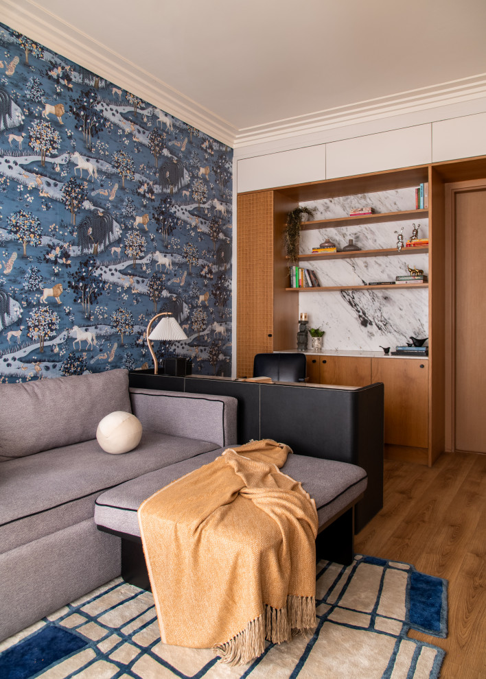 Contemporary home office in Delhi With Multi-coloured Walls, Medium Hardwood Floors and a Freestanding Desk.