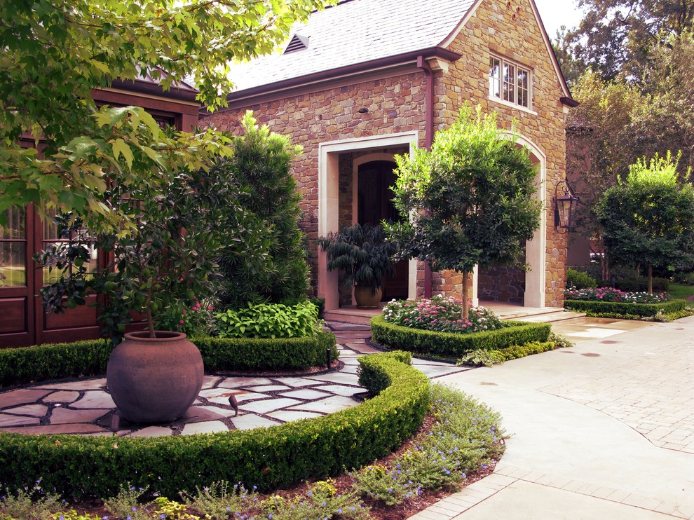 Example of a country home design design in Houston