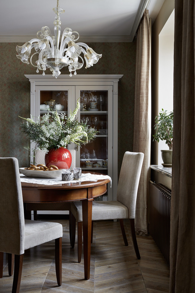 This is an example of a small transitional open plan dining in Moscow.