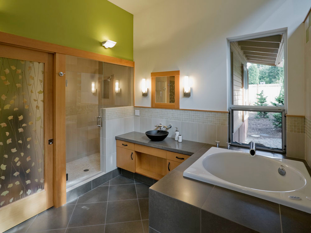 Contemporary bathroom in Seattle with a vessel sink and grey benchtops.
