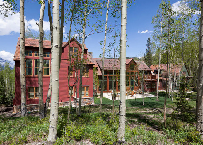 Rustic exterior home idea in Denver