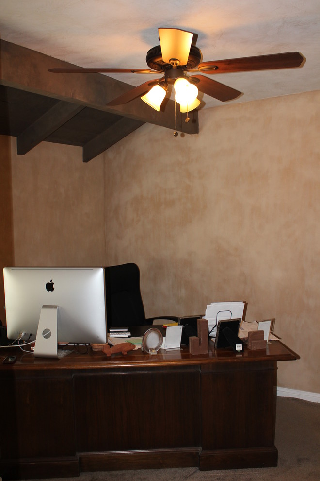 Example of a tuscan home office design in Orange County
