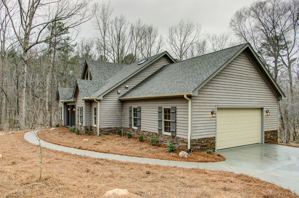 Rustic exterior home idea in Raleigh