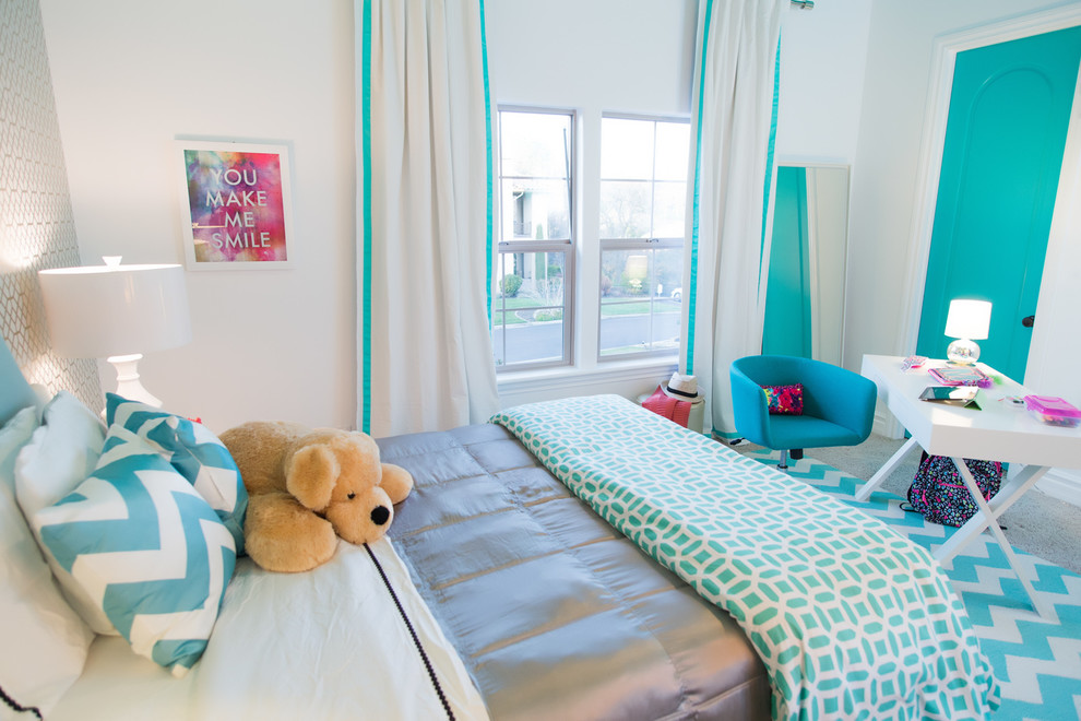 This is an example of a modern kids' room for girls in Sacramento with blue walls.