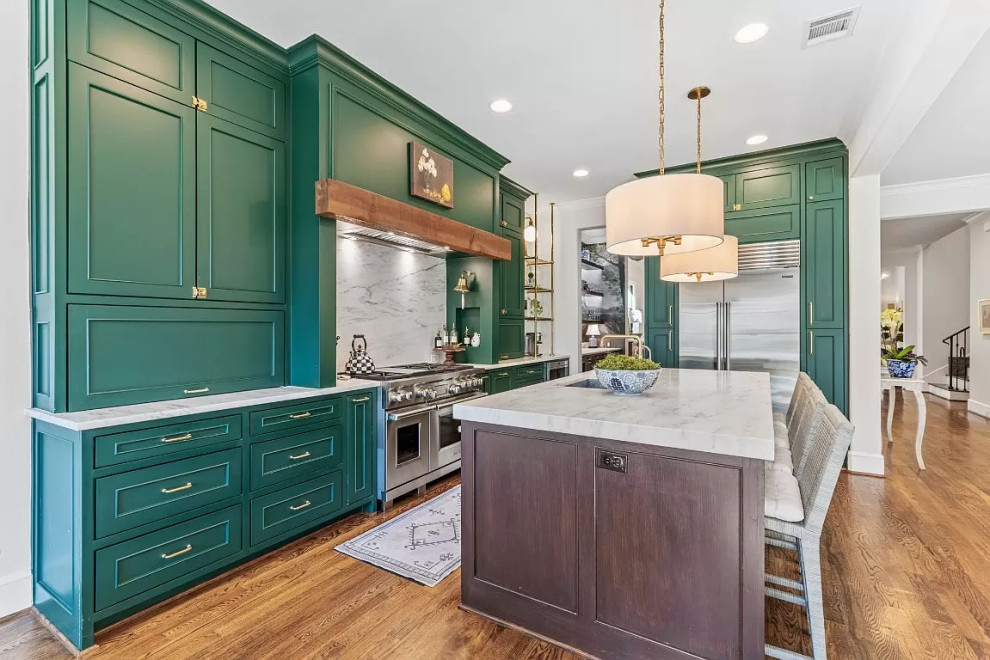 Inspiration for a mid-sized traditional l-shaped eat-in kitchen in Houston with shaker cabinets, green cabinets, quartzite benchtops, with island and white benchtop.