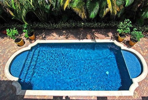 Design ideas for a mediterranean pool in Miami.